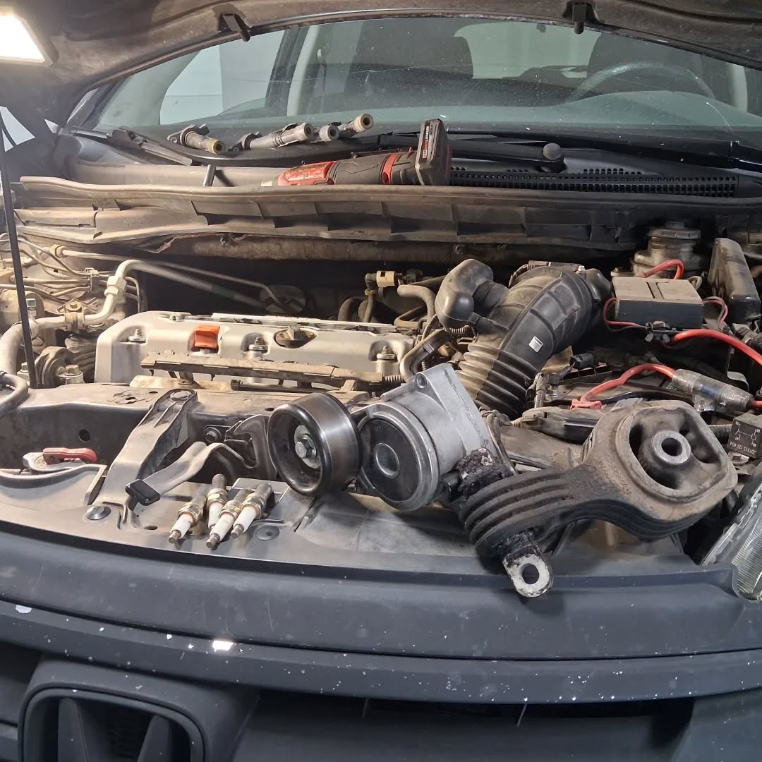 Serpentine belt and tensioner replacement on a vehicle